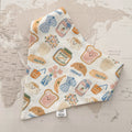 Dog bandana with breakfast related motifs on a world map background.
