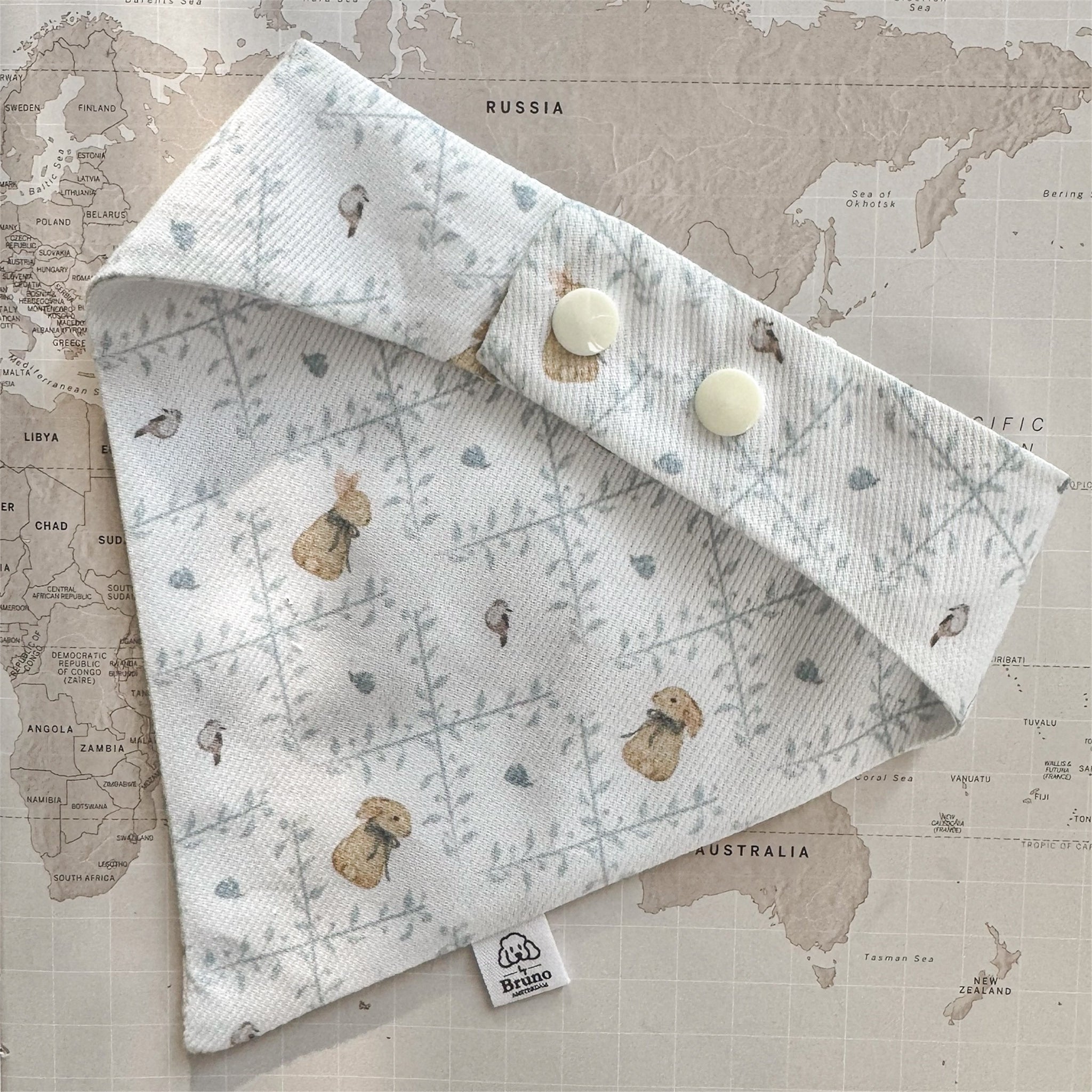 Easter dog bandana, back side, with plastic buttons.