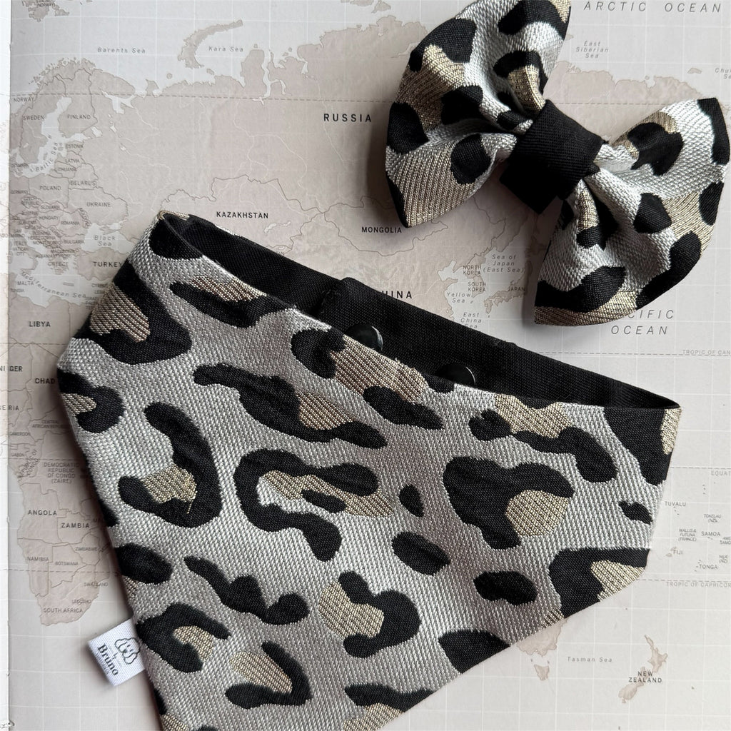 Leopard dog bandana with leopard dog bow on a world map background.