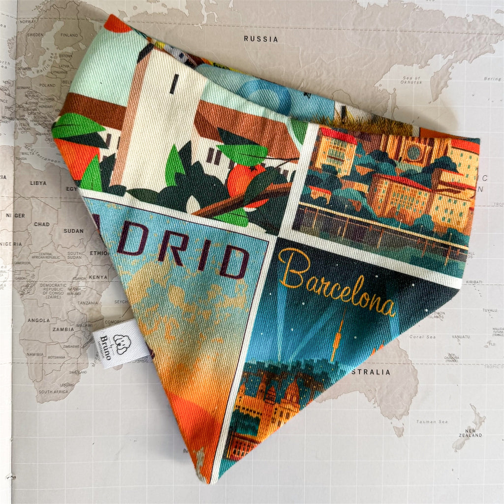 Colorful bandana with Spanish city-themed designs on a map background.