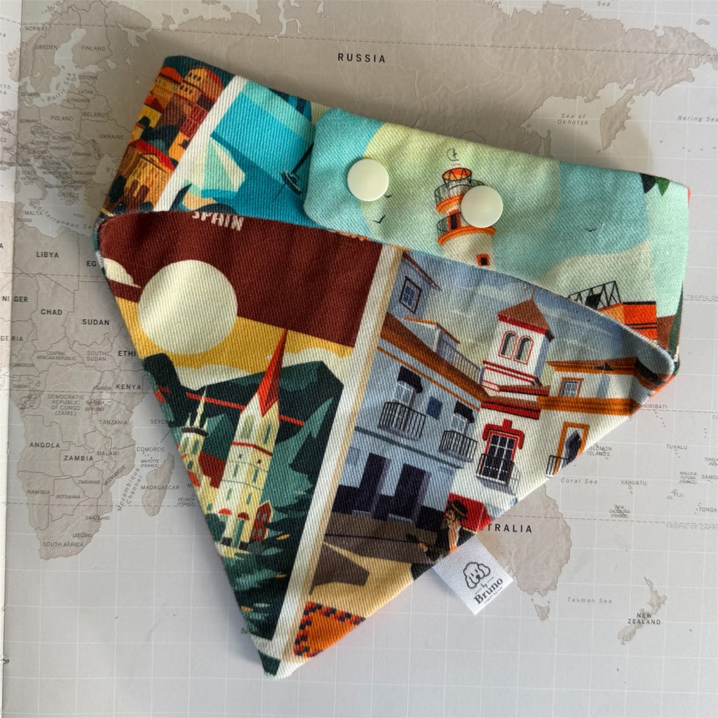 Back side of the Postcards from Spain bandana with plastic buttons on a map background.